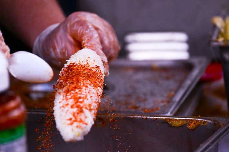 Mexican street corn on the cob with cotija cheese and chili